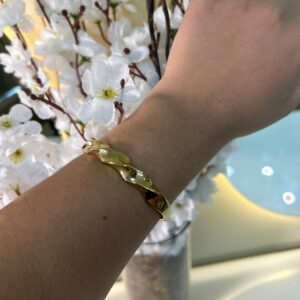 BRACELETE TRANÇADO DOURADO DE AÇO