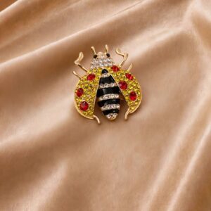 BROCHE JOANINHA AMARELA